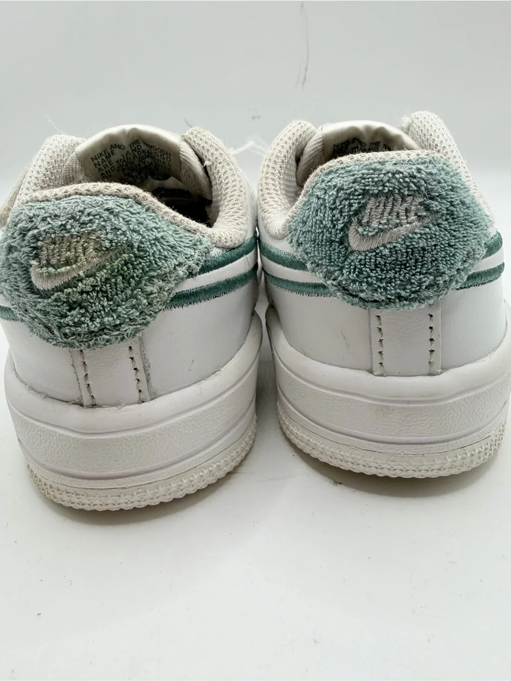 Nike White Kids Sneakers with Dark Green Swoosh